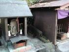 This is a set of small shrines alone the road to the larger shrine