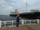 This is a very old shipping boat that is in the Yokohama Bay