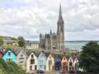 St Coleman's Cathedral sits above the colorful houses of West View