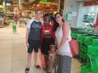 My two friends Estefan and Louisa next to a mother and her child dressed up in Heritage Day attire