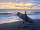 My favorite time to surf is at sunset because the waves are calmer and the sky is so colorful. 