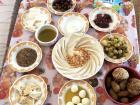 Hummus, Za'atar, falafel, olives, cheese and bread for yummy breakfast to share!