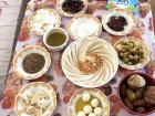 Traditional Palestinian breakfast. Can you guess how many olive-derived dishes are in this photo?