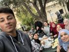 Eating lunch with students in the courtyard of America House, which was built around an olive tree that is more than 250 years old