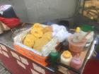 This is an example of street food: "Sopaipillas" which are a fried pumpkin based  treat