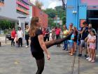 One member kicks her leg high...this is the most famous move of Irish dance