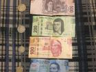 These are colorful peso bills in amounts of 500, 200, 100 and 20 and coins in 10, 5, 1 and 50 cent amounts