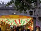 At one of the many famous "eat streets," both sides of the street lined with street food merchants and shops