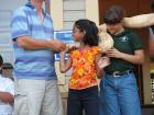 A snake on nine-year-old Deepa's shoulders