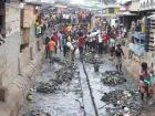 Sometimes people have to walk and work around sewers that might be flooding https://cdn.ghanaweb.com/imagelib/pics/91903929.295.jpg