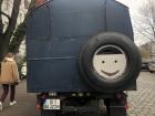 A happy truck on the street