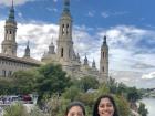 I visited Zaragoza during the Fiestas del Pilar and saw the Basílica de Nuestra Señora del Pilar, learning about Spain's traditions and religious history