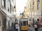 A yellow street car in Lisbon