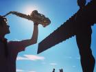 Playing music to the Angel of the North near Newcastle, England
