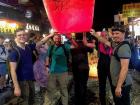 In Taiwan, we wrote our wishes with paint onto a lantern and set it free into the sky!