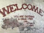 Painting walls is a very common from of advertising, like this warning on the wall of what used to be an old prison