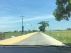 Can you guess which staple food of the Philippines they are drying on the side of the road? 