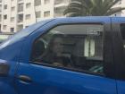 My friend Madeline in a "petit taxi" on our way to class; in Rabat, taxis are royal blue!