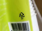 Paper items usually have a recycle symbol and a double P on the bag for paper