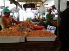 At the market, it's very common to see vendors selling shrimp and fish caught from the Amazon River!