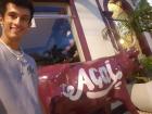 The word "açaí" spray-painted on a bull statue. Açaí has a huge cultural significance here!