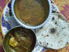 A meal of chapati, daal and potato-pea subji