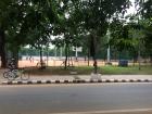 Children playing tennis at the nearby park