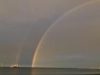 It doesn't rain very often, but when it does we sometimes see a rainbow over the ocean