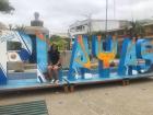 Me sitting on the Playas sign when I made it to the beach