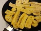 My host mom frying some plantains for me