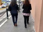 Two business women walking to work