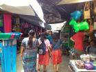 The Rabinal market is tucked under tin roofs where people sell many different items