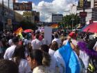 Marching through the streets at the Pride Parade