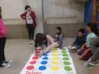 A game like twister is a great way to practice second language skills.