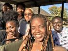 This is a picture of me and my friends in one of the game drive trucks. During a game drive you sit in an open truck so that you can see all animals close up.