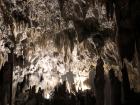 Stalactites hang from the ceiling and stalagmites grow from the ground up in caves, making incredible formations