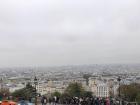 If you climb up the steps to the Sacre-Cœur Church you can have a beautiful view of Paris. This picture shows how foggy and cloudy it was over the city. 