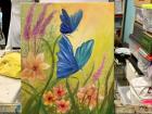 One of my oil paintings features blue butterflies that remind me of my grandma