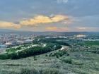 Can you spot the city, the mountains and natural areas?