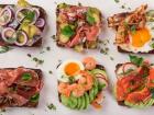 Some types of Danish sandwiches, with meat, eggs and spreads on rye bread