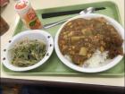 Eating curry with a pickle dish (tsukemono) at a local kindergarten