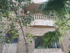 This is what Nardeen's home looks like from the outside; she and her family live in an apartment upstairs