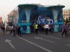 A small themed tunnel at the parade that was set up in the middle of the street with pictures of different Russian ships inside