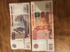 The fronts of the 5,000 (the largest bill in Russia) and the 500 ruble; notice how the 5,000 is actually larger than the 500