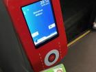 When you enter the tram, you tap your MOBIB card on the red box to pay