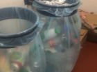 Plastic, cans, cartons, paper and bottles are recycled daily in color-coded bags