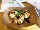 Bao dumplings on a cardboard plate