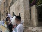 A group of kids enjoying some cotton candy in the Old City of Jerusalem 