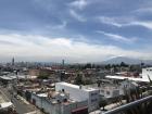 This is a view of the city of Puebla from the top of the roof of my university. It is a large city with a lot of people! You can also see the active volcano in the background!
