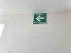 These signs are found in all buildings in Puebla. They point the direction of the exit in case of an earthquake. 